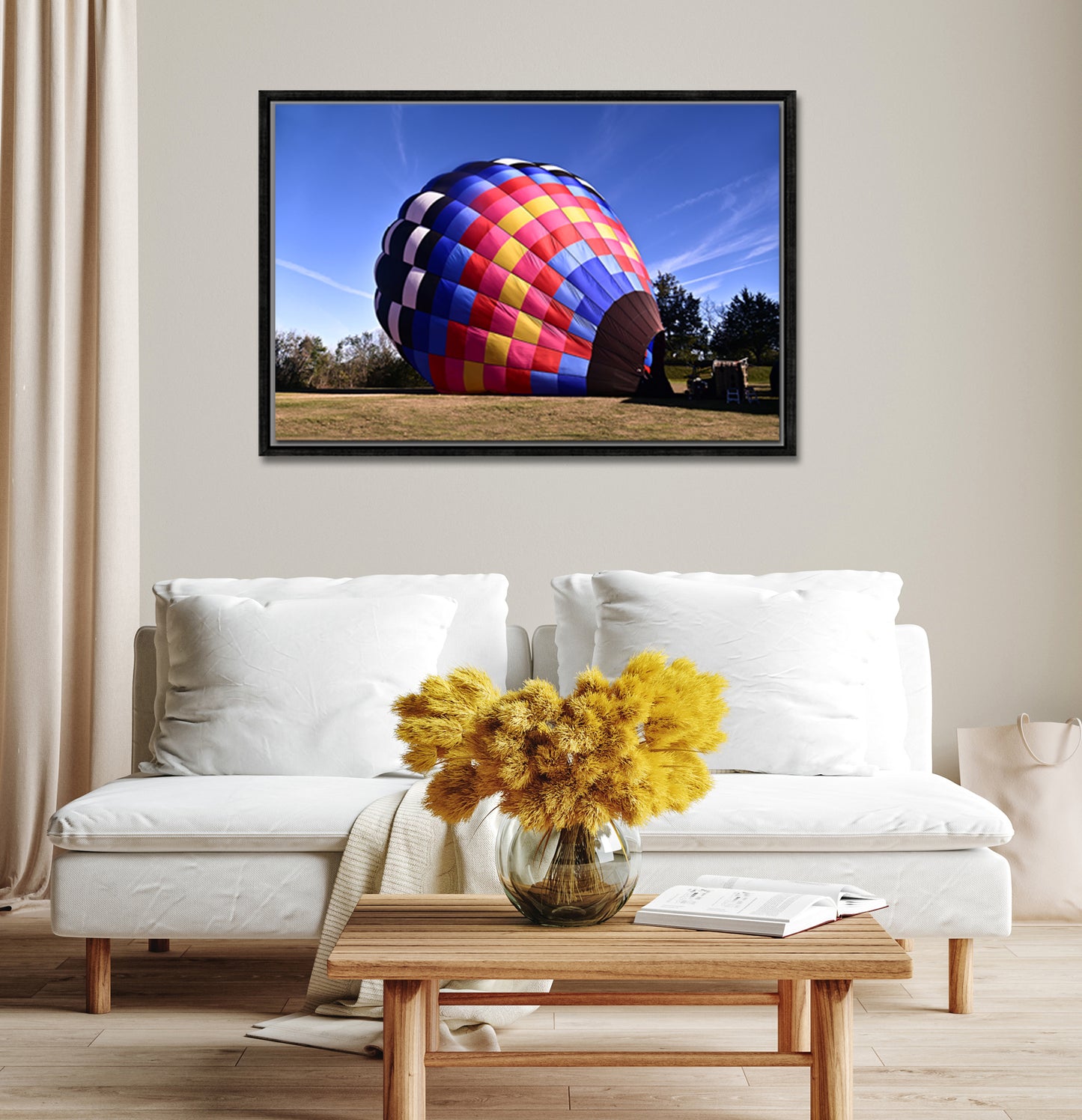 Brightly colored hot air balloon ready for flight. Framed canvas print by Kristen Olivares
