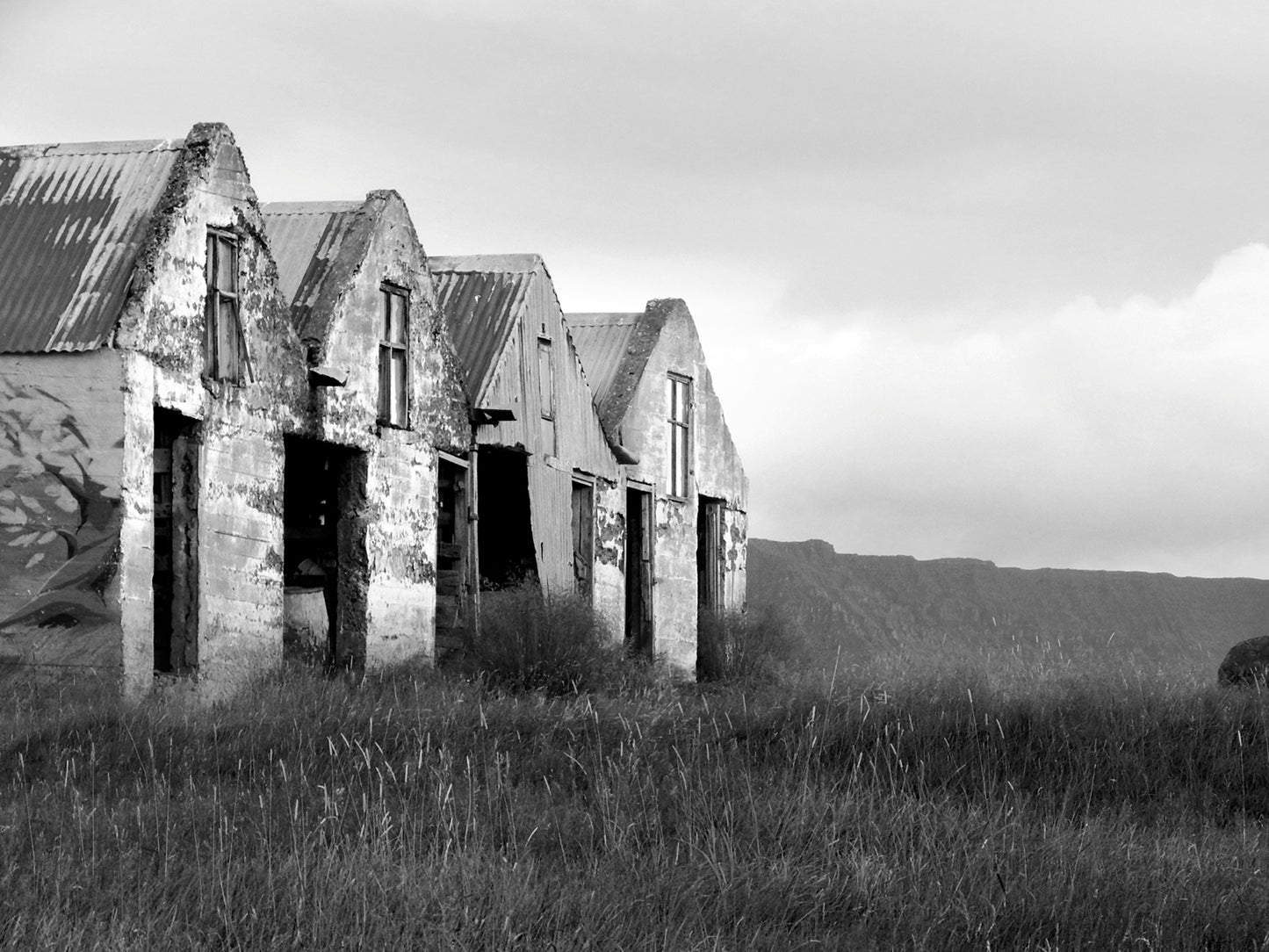 Four old, stone shacks in Iceland. Fine Art Photography. Kristen Olivares.