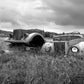 Beautiful, abandoned, antique cars left out in a field in Iceland. Black and white Fine art photography by Kristen Olivares. 