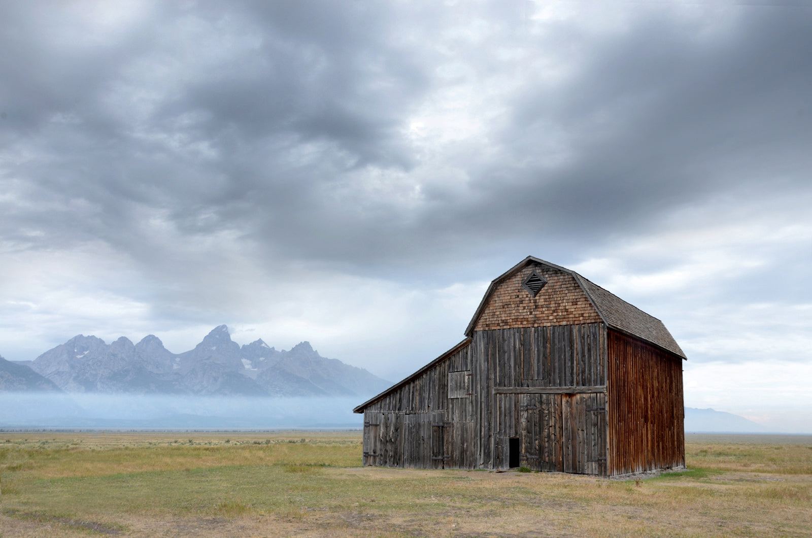 Beautiful old barn among the group of John Moultons Barns in the Grand Tetons. Framed Canvas Wall Art. Fine Art Photography by Kristen Olivares.