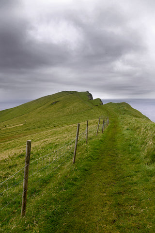 A trail on a cliff in Mykines Island, Faroe Islands.  Fine Art Photography. Kristen Olivares