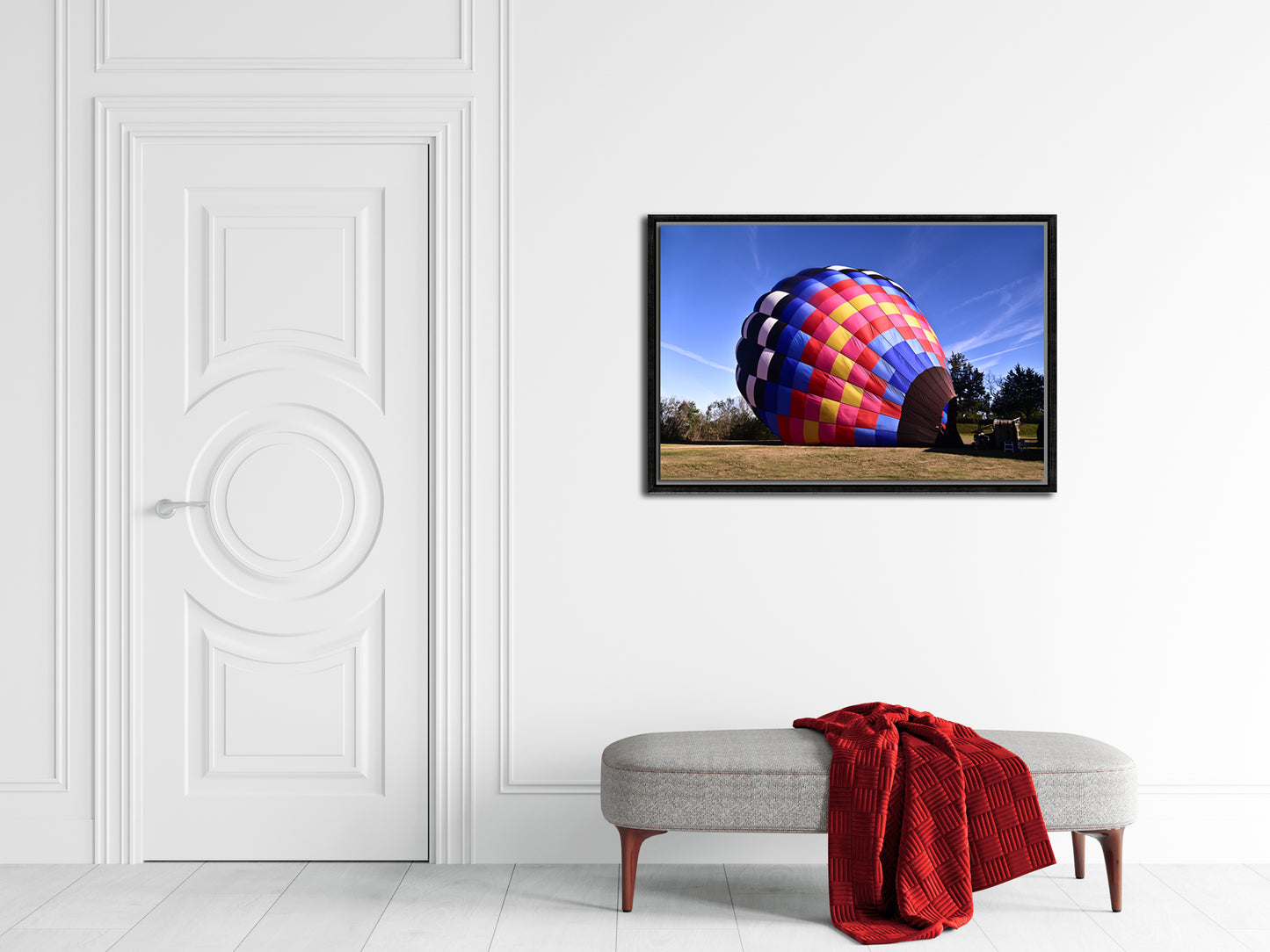 Brightly colored hot air balloon ready for flight. Framed canvas print by Kristen Olivares