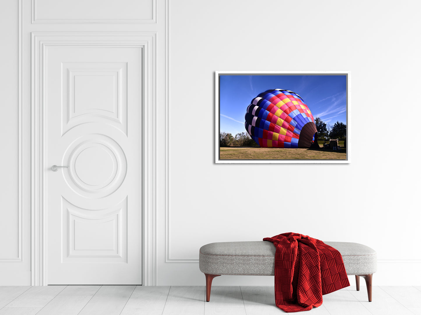 Brightly colored hot air balloon ready for flight. Framed canvas print by Kristen Olivares