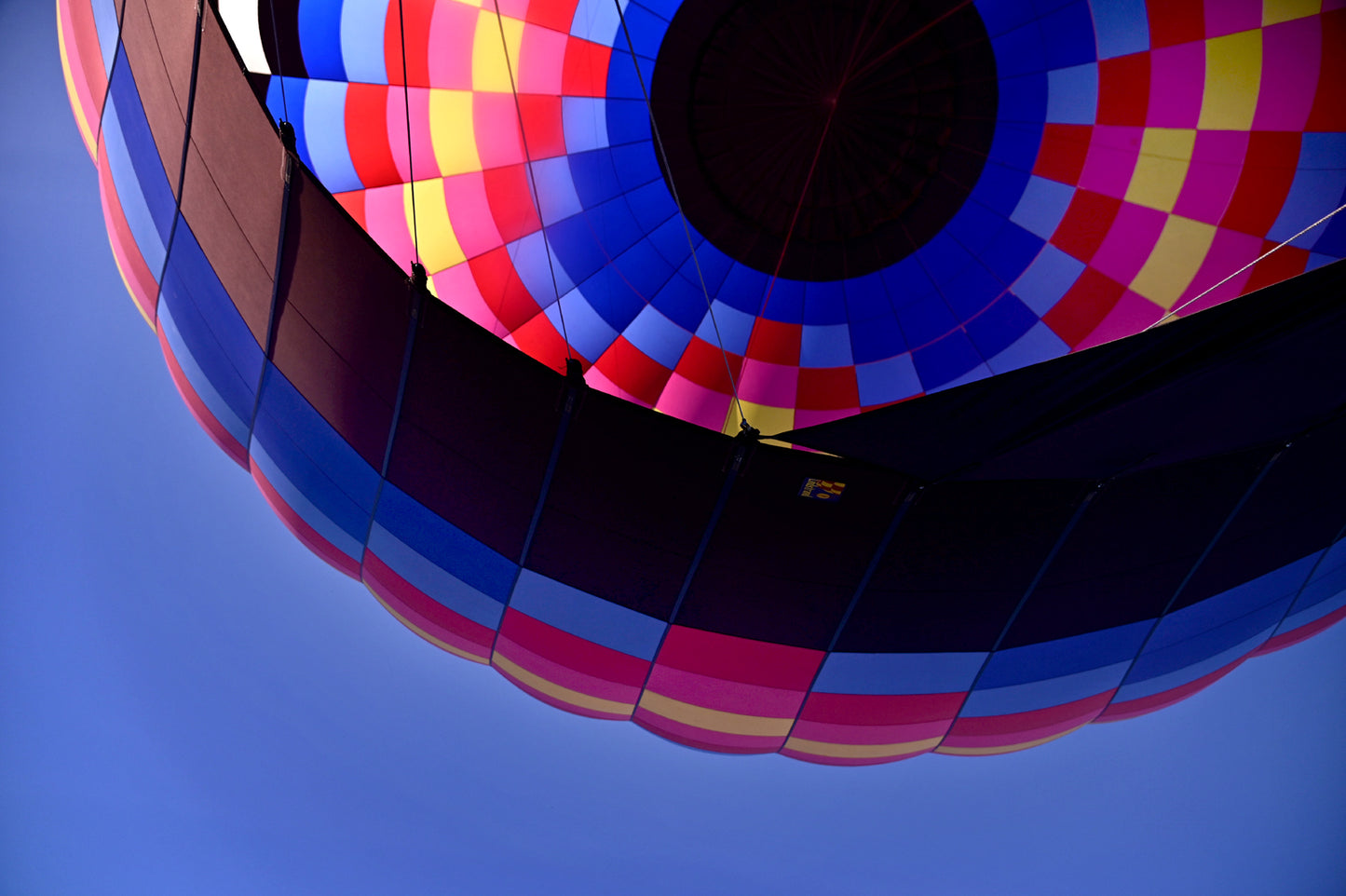 A bright hot air balloon a mile high in the sky bright, colorful fine Art photography Framed wall art by Kristen Olivares