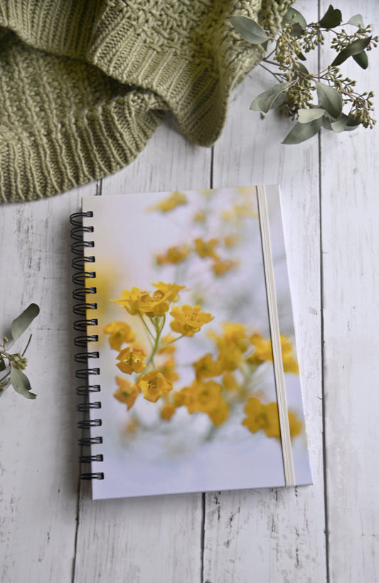 Bright and beautiful photo of yellow Rapeseed flowers. Durable hardcover journal-200 lined pages- photo by Kristen Olivares.