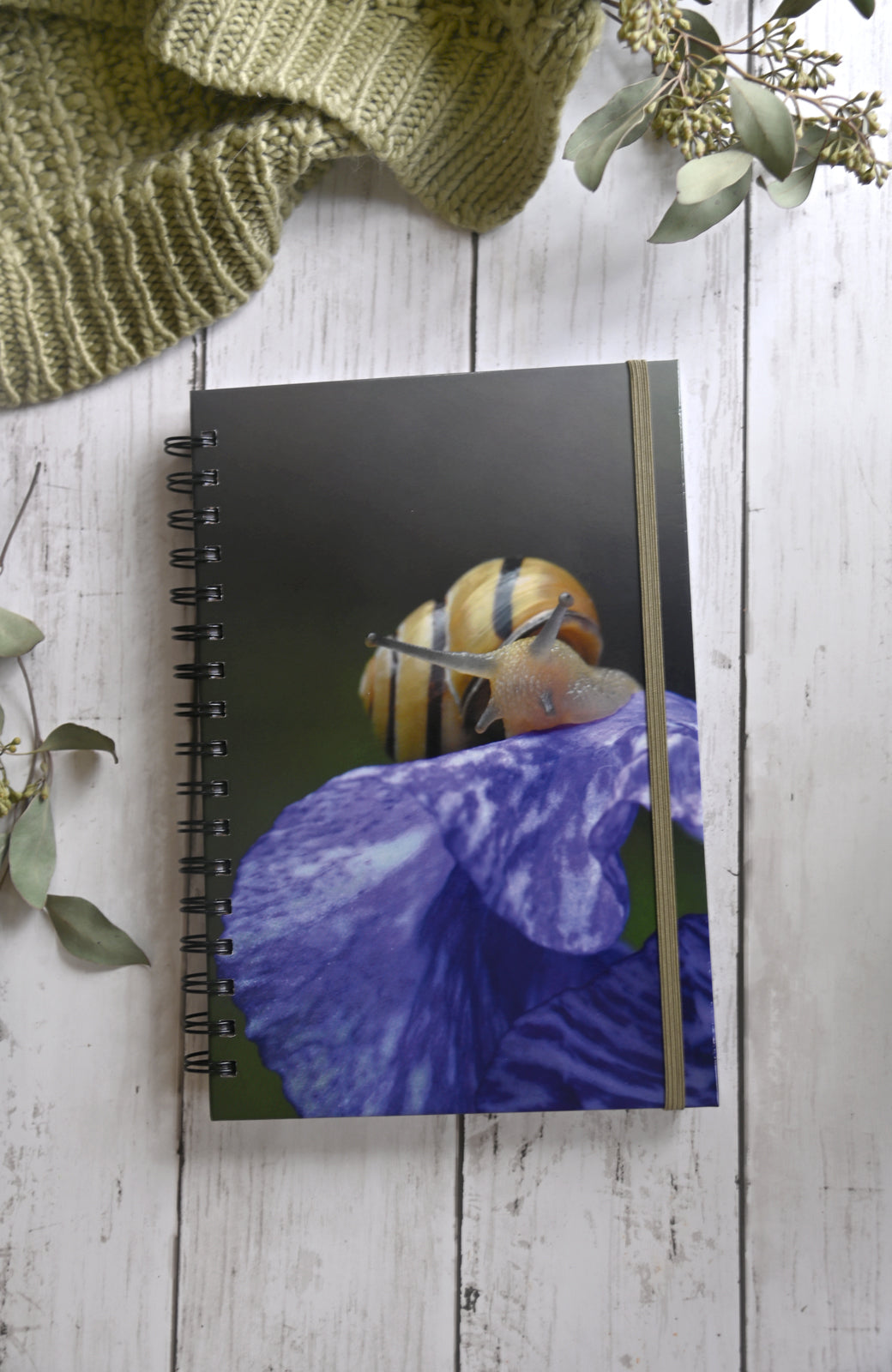 Beautiful photo of a yellow snail crawling on an Iris flower. Durable hardcover journal-200 lined pages- photo by Kristen Olivares