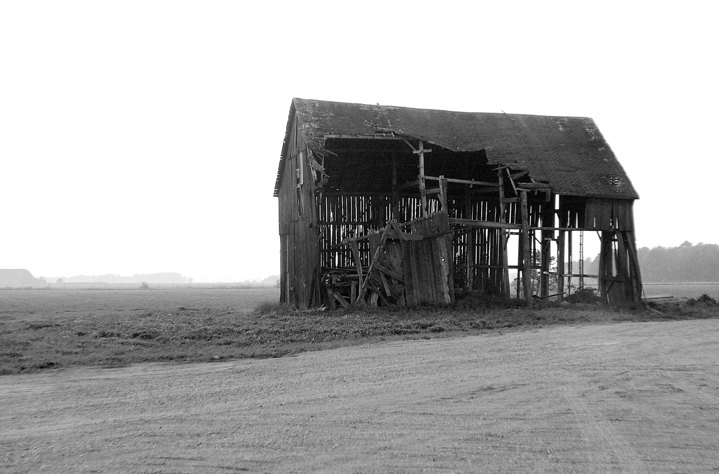 Beautiful old abandoned barn in Michigan. Black and White image.Framed fine art photography by Kristen Olivares.