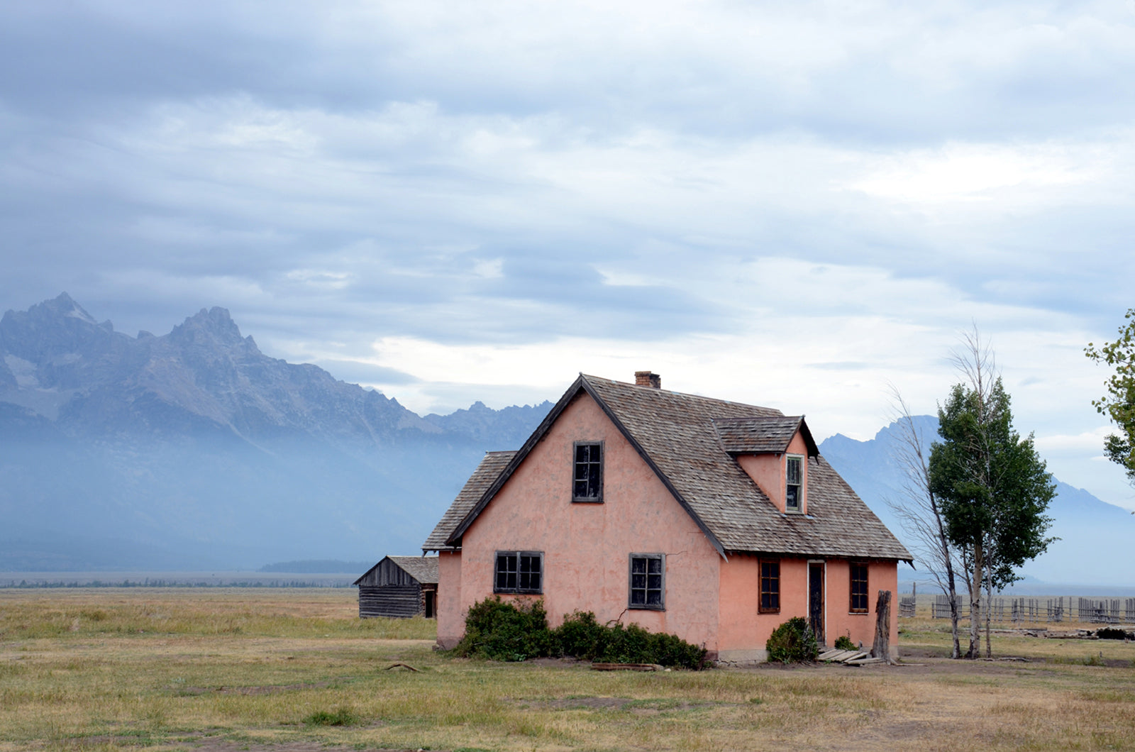 Beautiful old pinkish house in the Grand Tetons upon the John Moulton Barns. Wall Art Fine Art Photography by Kristen Olivares