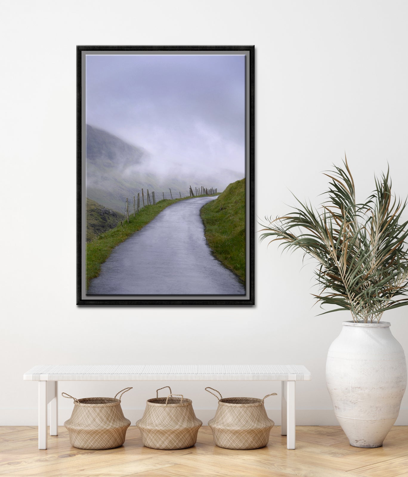 A beautiful quiet path along an old fence surrounded by fog in the Faroe Islands. Framed fine art photography by Kristen Olivares.