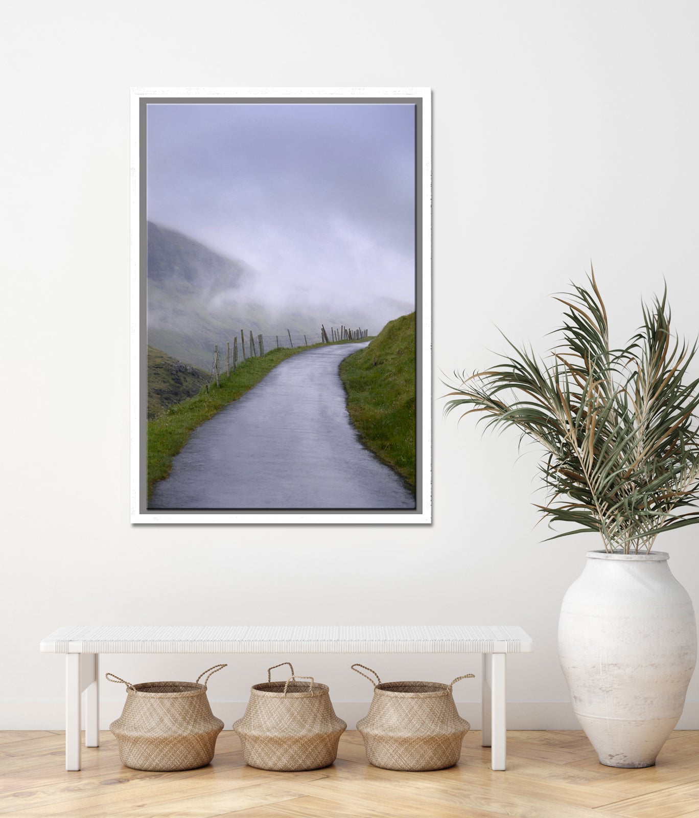 A beautiful quiet path along an old fence surrounded by fog in the Faroe Islands. Framed fine art photography by Kristen Olivares.