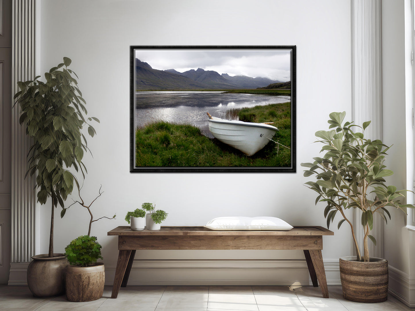 A beautiful little white row boat pulled up upon the desolate shore of Iceland. Framed canvas wall art. Fine art photography by Kristen Olivares. 
