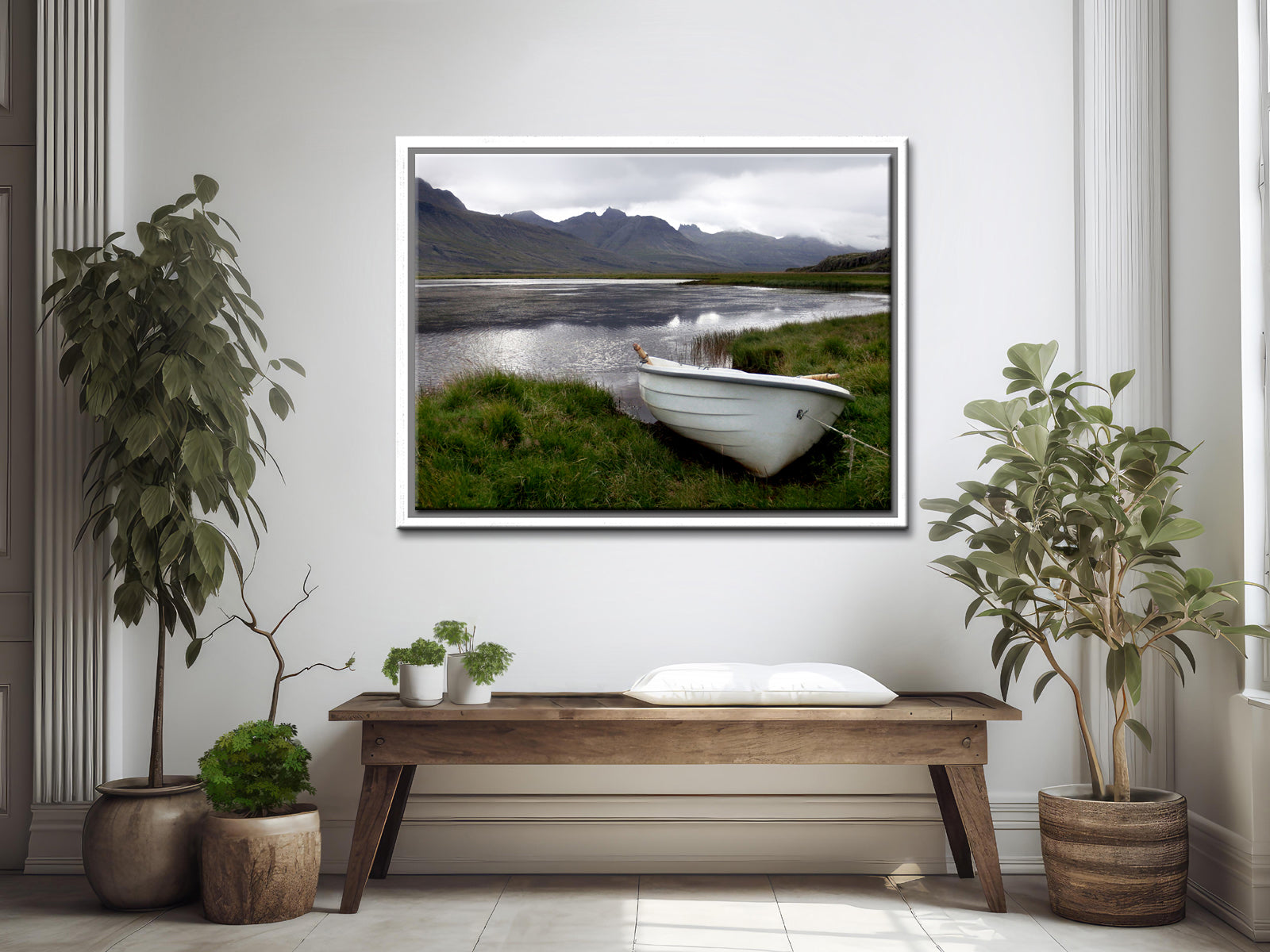 A beautiful little white row boat pulled up upon the desolate shore of Iceland. Framed canvas wall art. Fine art photography by Kristen Olivares. 