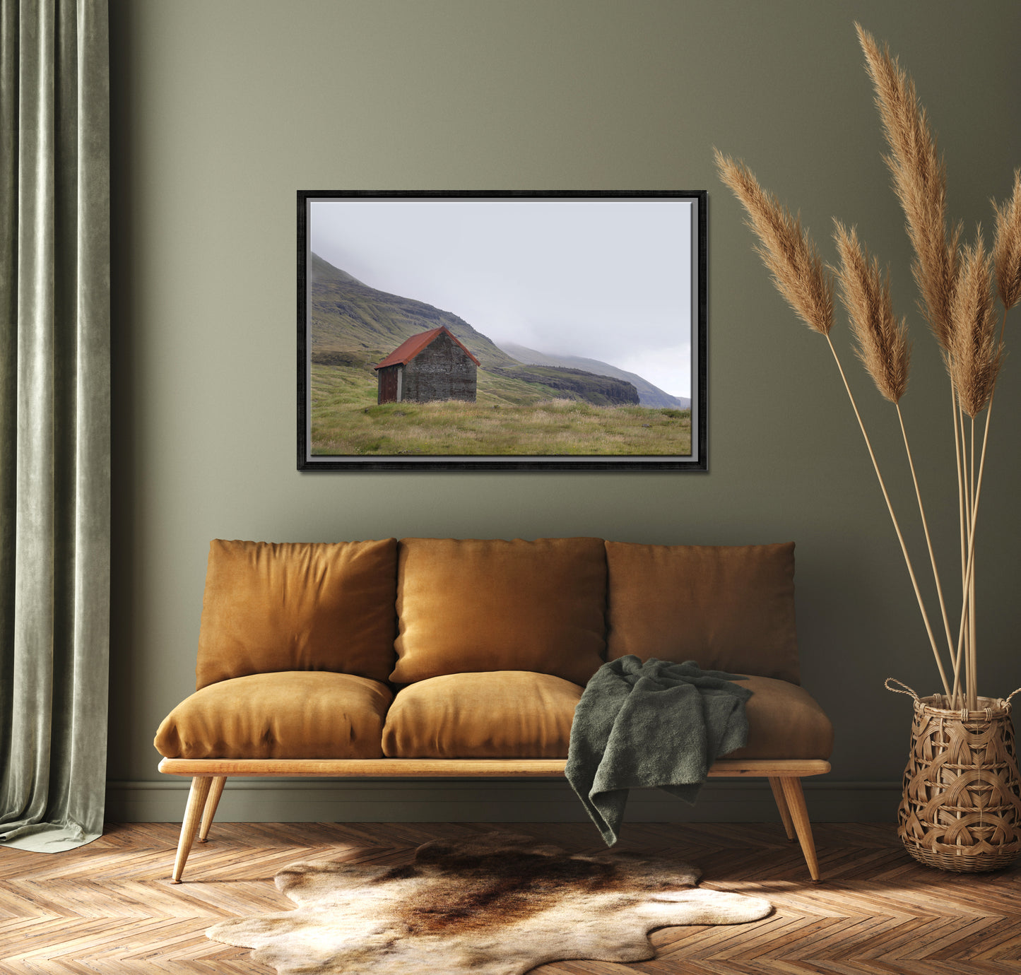 An old stone shack with a rusty colored roof set in the desolate foggy land of the Faroe Islands. Framed fine art photography by Kristen Olivares.