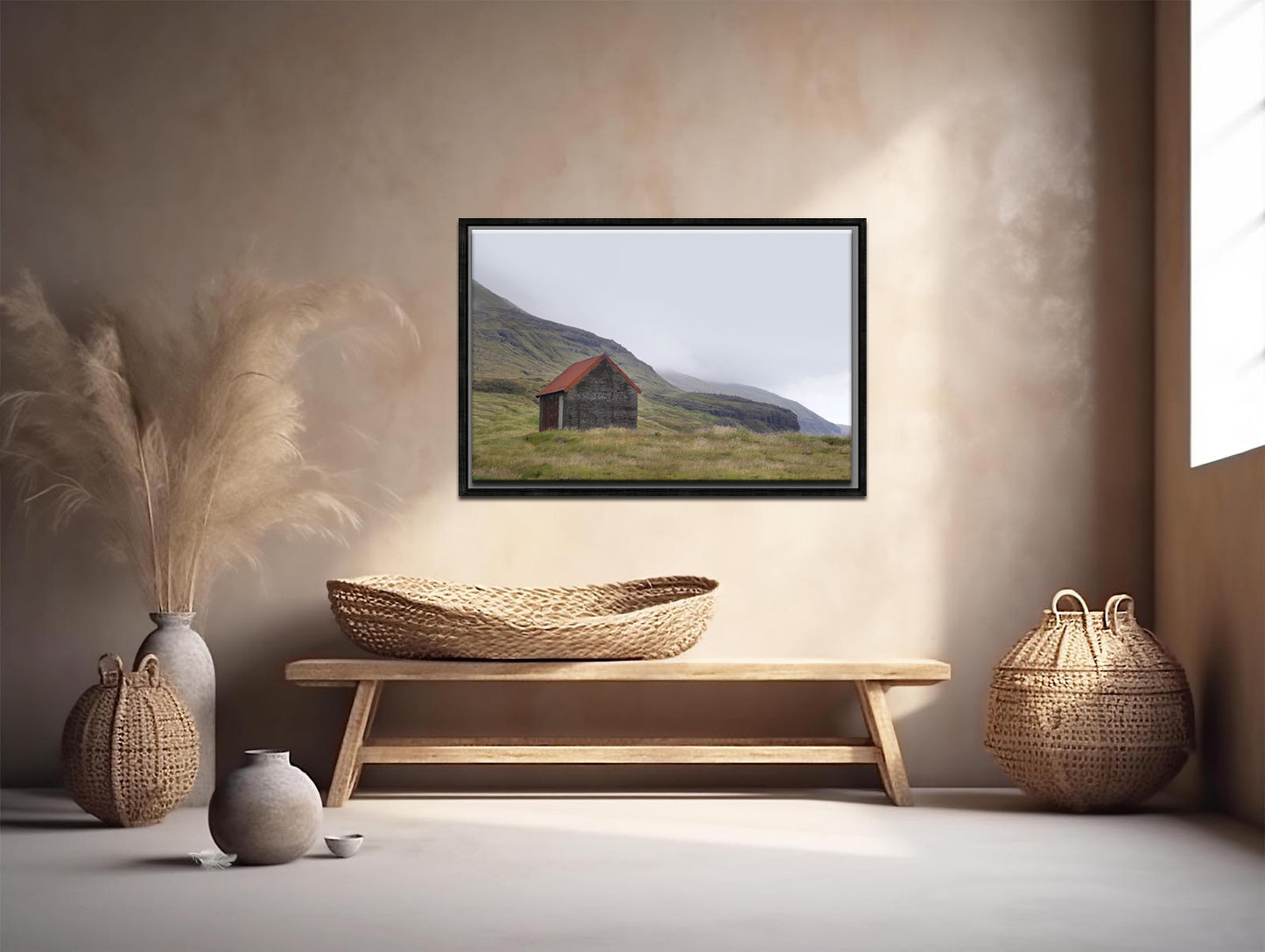 An old stone shack with a rusty colored roof set in the desolate foggy land of the Faroe Islands. Framed fine art photography by Kristen Olivares.