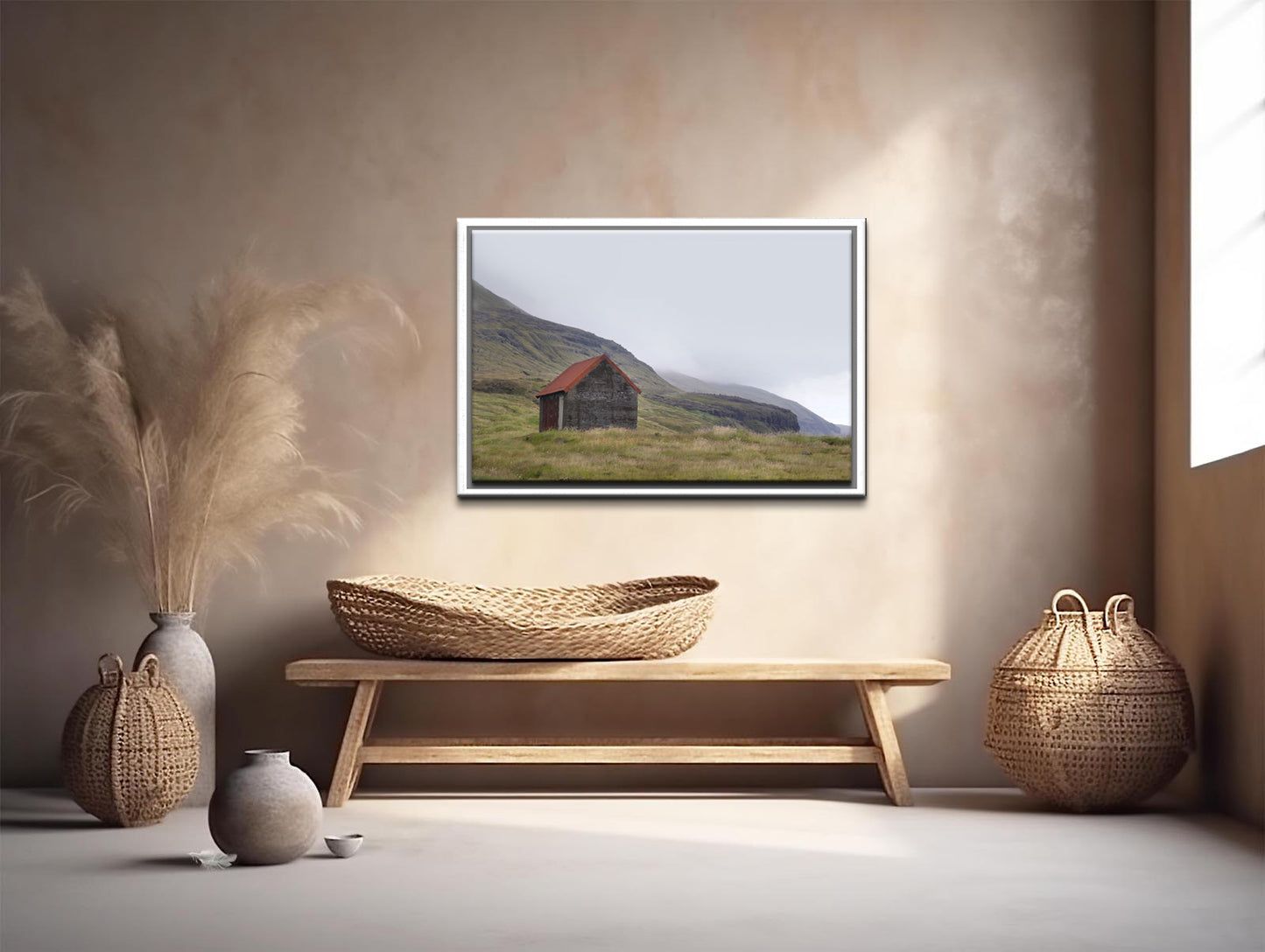 An old stone shack with a rusty colored roof set in the desolate foggy land of the Faroe Islands. Framed fine art photography by Kristen Olivares.