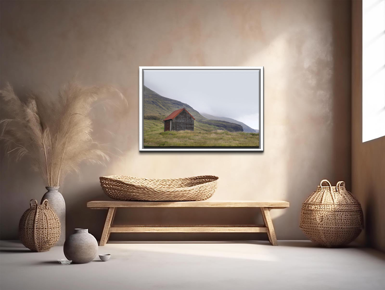 An old stone shack with a rusty colored roof set in the desolate foggy land of the Faroe Islands. Framed fine art photography by Kristen Olivares.