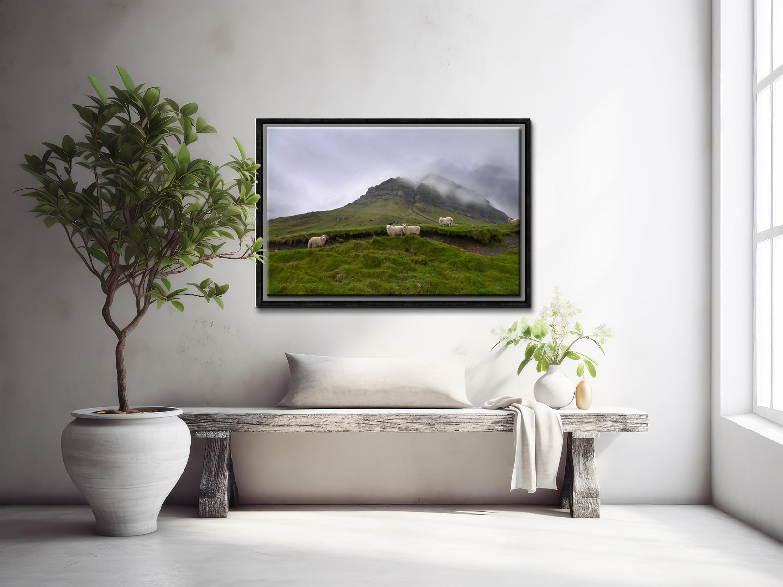 Sheep gathering at the base of a beautiful foggy cliff in the Faroe Islands. Framed fine art photography by Kristen Olivares.