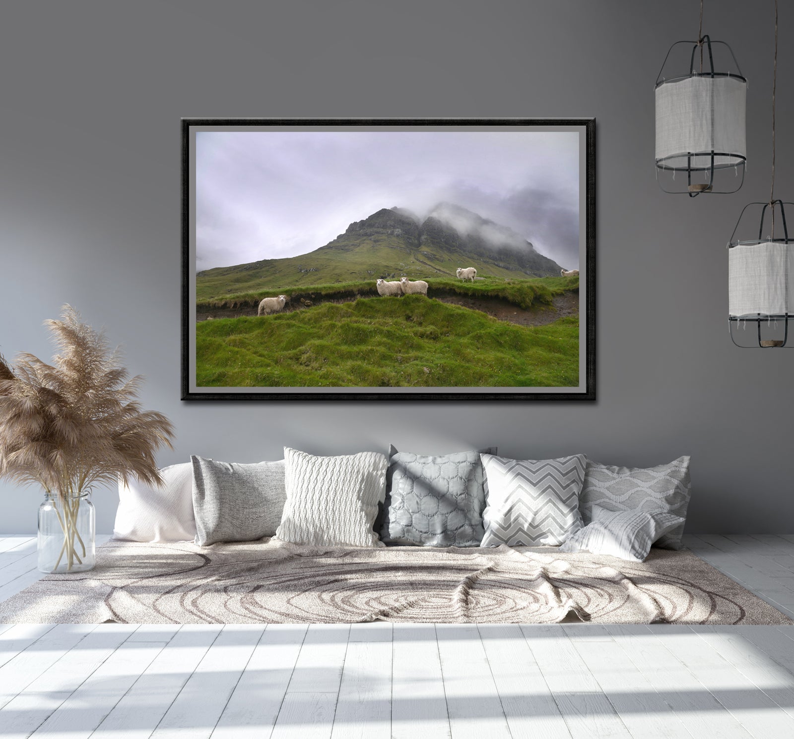 Sheep gathering at the base of a beautiful foggy cliff in the Faroe Islands. Framed fine art photography by Kristen Olivares.