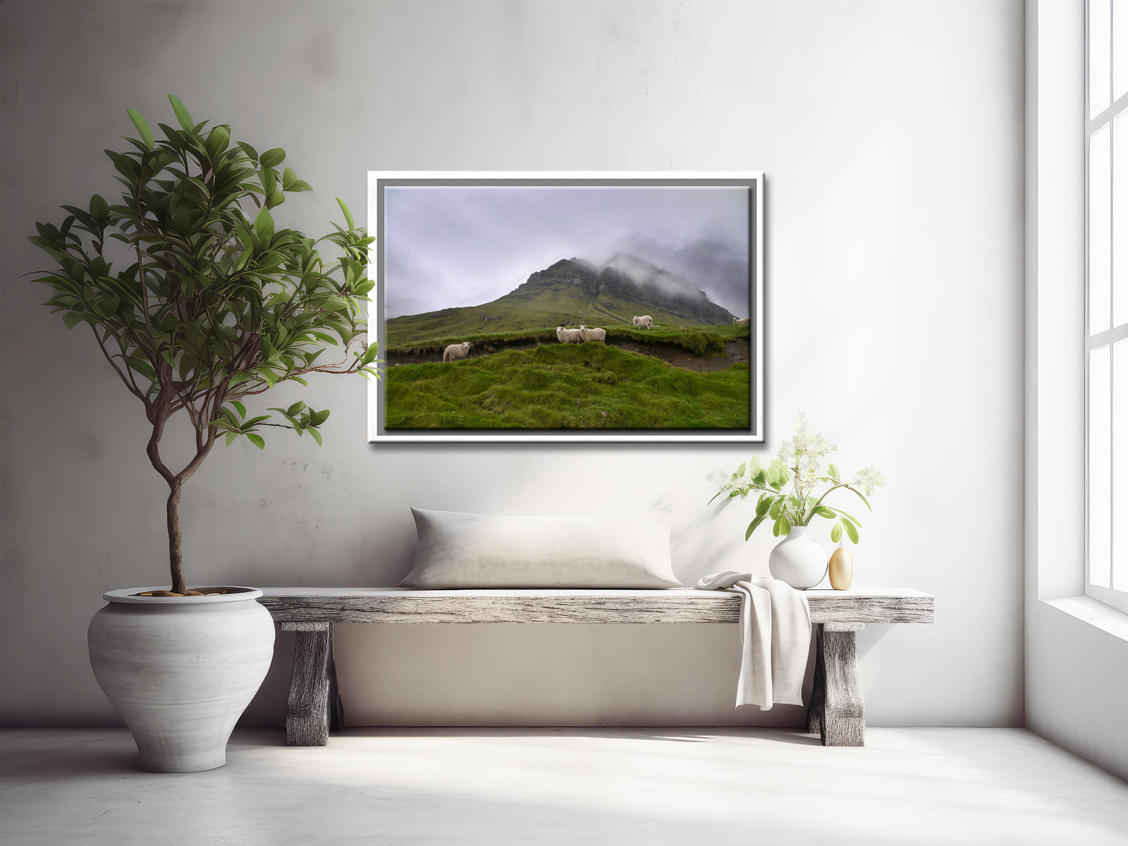 Sheep gathering at the base of a beautiful foggy cliff in the Faroe Islands. Framed fine art photography by Kristen Olivares.
