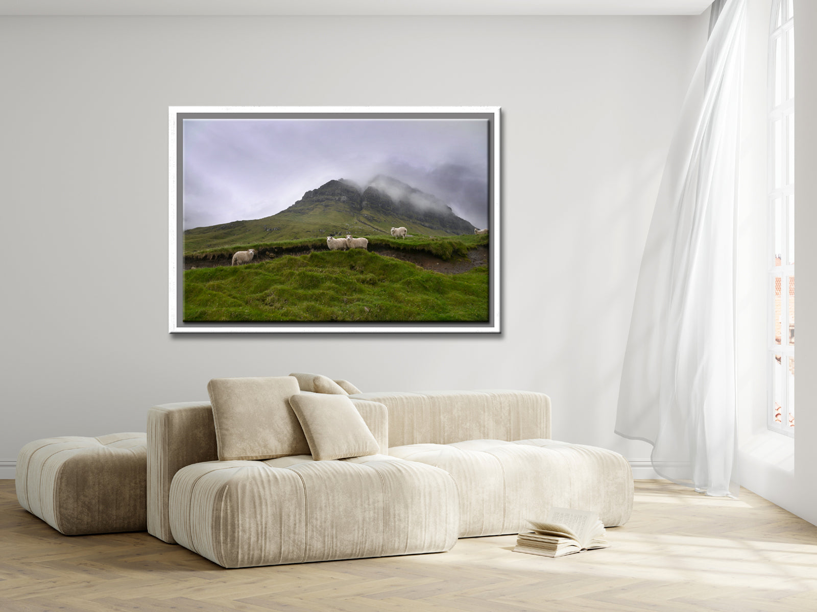 Sheep gathering at the base of a beautiful foggy cliff in the Faroe Islands. Framed fine art photography by Kristen Olivares.