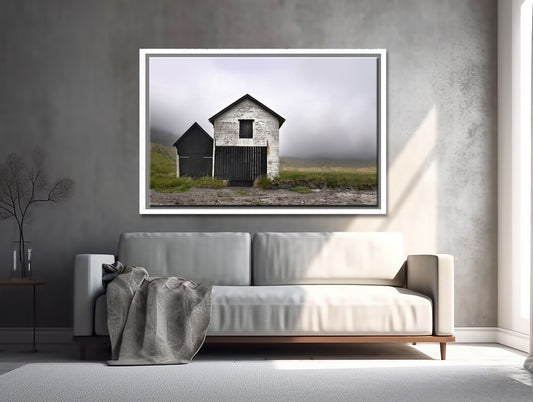A beautiful, stone boat house set on the coast of the Faroe Islands. Framed fine art photography by Kristen Olivares.