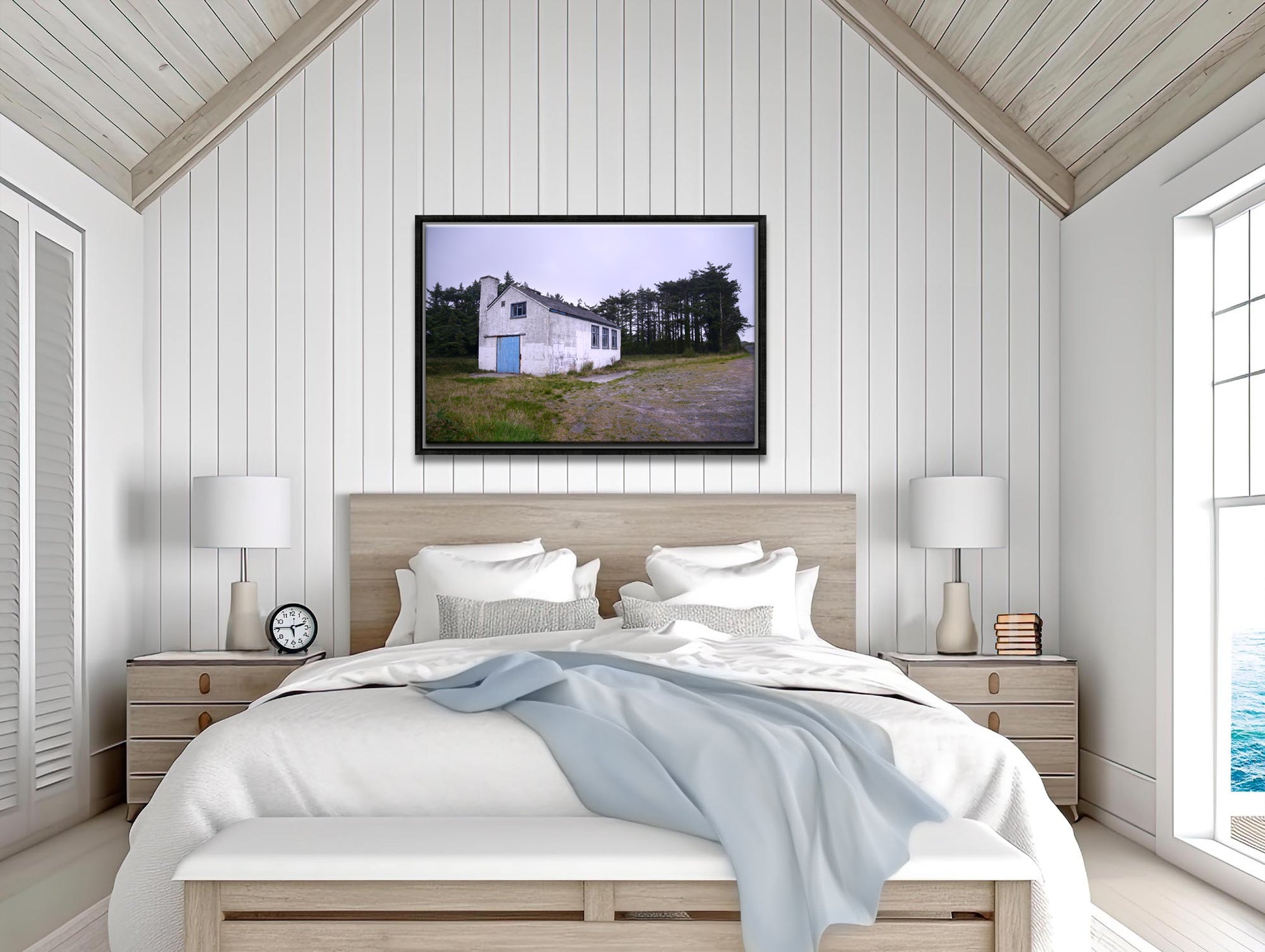 A photo of a stone white house in Ireland with a blue door. Framed canvas print by Kristen Olivares