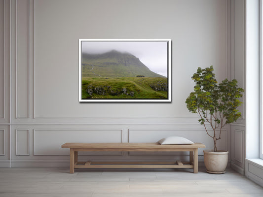 Beautiful old stone shack used to a sheep shelter in the foggy lands of the Faroe Islands. Framed fine art photography by Kristen Olivares