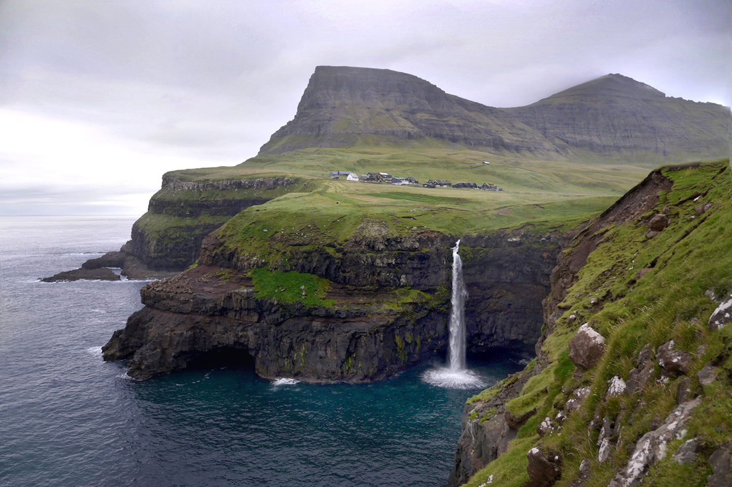 Stunning image of Gasadalur Falls in the suit Islands. Waterfall. Framed fine art photography by Kristen Olivares.