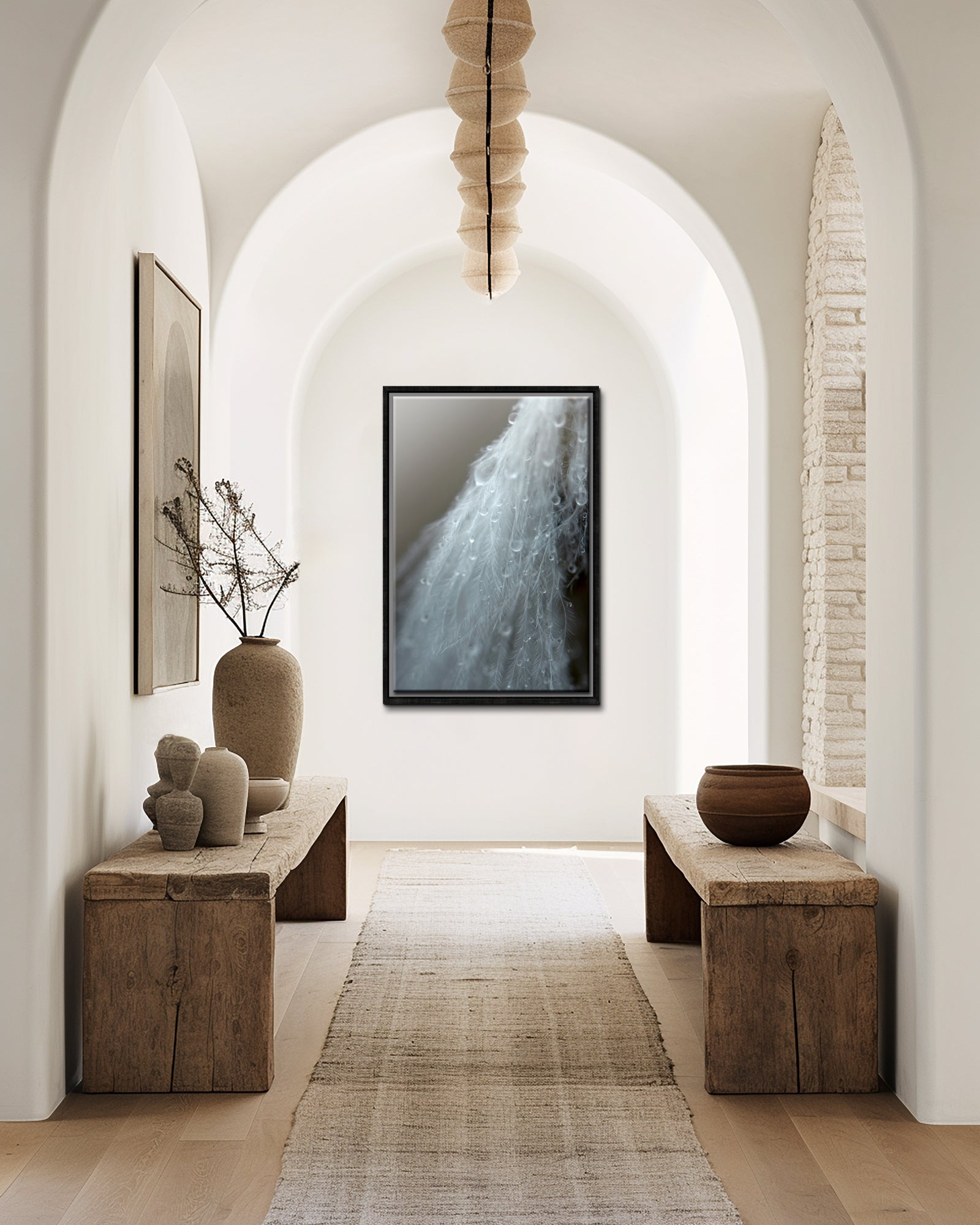 A beautiful white feather covered in rain drops. Framed fine art photography by Kristen Olivares.