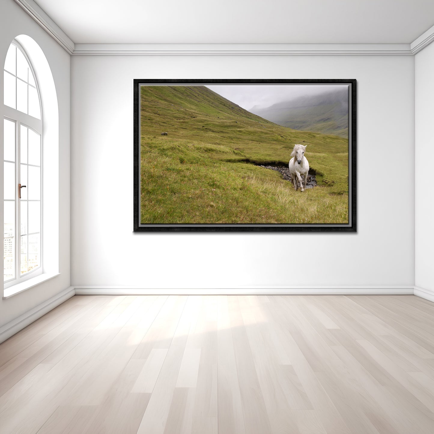 A majestic wild, white horse running free through the foggy cliffs of the Faroe Islands. Framed canvas wall art by Kristen Olivares