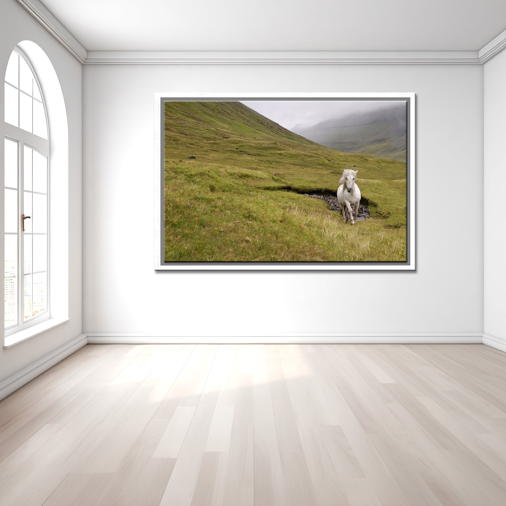 A majestic wild, white horse running free through the foggy cliffs of the Faroe Islands. Framed canvas wall art by Kristen Olivares